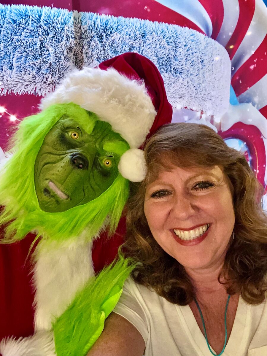 Mrs. Terri Claus with Santa Dave as the Grinch