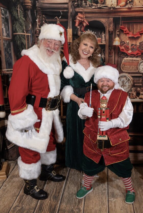 Santa Dave, an elf and Mrs. Claus